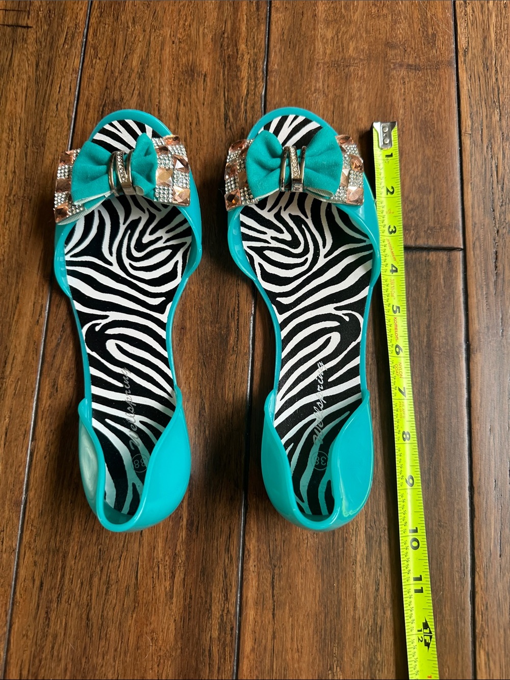 Enzo Angiolini Teal Bow Flats with Zebra Insole and Metallic Trim